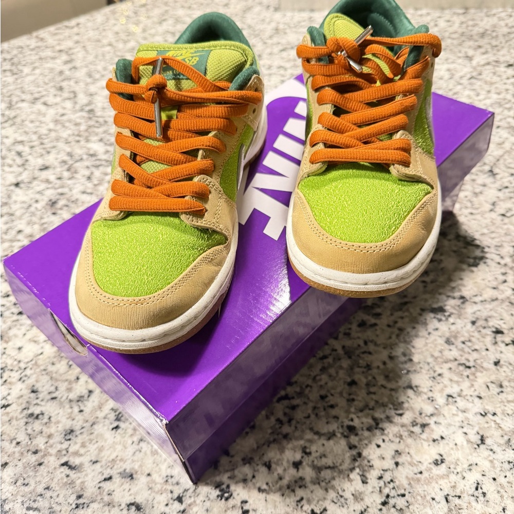 Nike SB Dunk Low Pro "Escargot" shoe in the Sesame/Pear colorway.